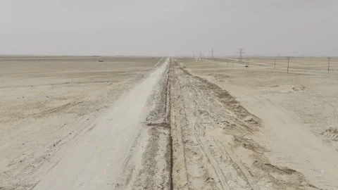 Aerial View of Pipeline Construction Corridor Across Saudi Arabian Desert Stock Footage 344824225