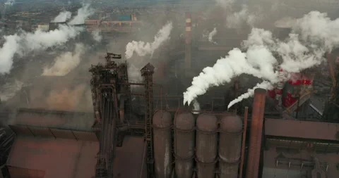 Aerial view. Pipes Throwing Smoke in the Sky. Video stock 132392636