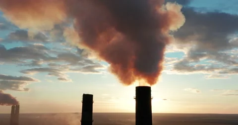 Aerial view. Pipes Throwing Smoke in the Sky at the sunset. Vídeos de archivo 137630448