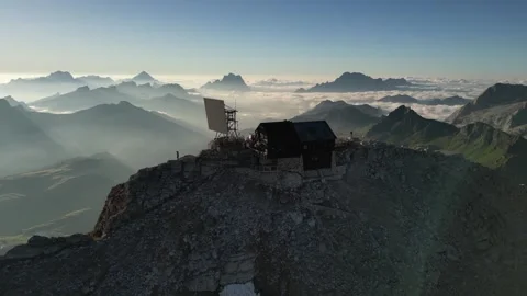 Aerial view of Piz Boe summit with Rifugio Capanna Piz Fassa Stock Footage 307602601
