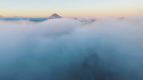 Aerial View. The plane flies through clouds. Amazing view. Mountain during Stock Footage 72996653