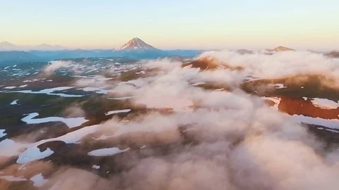 Aerial View. The plane flies through clouds. Amazing view. Mountain during Stock Footage 72996867