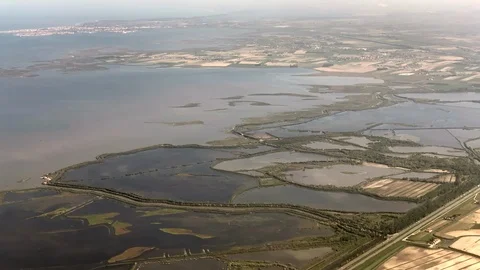 AERIAL View from the plane flying over the Venetian Lagoon Stock Footage 107980185