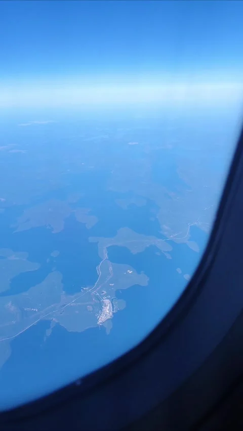 Aerial view from plane Window. Beautiful blue lakes on the Kola Peninsula. Видео 286144819