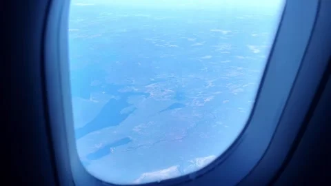 Aerial view from plane Window. Beautiful blue lakes on the Kola Peninsula. Stock Footage 286303346