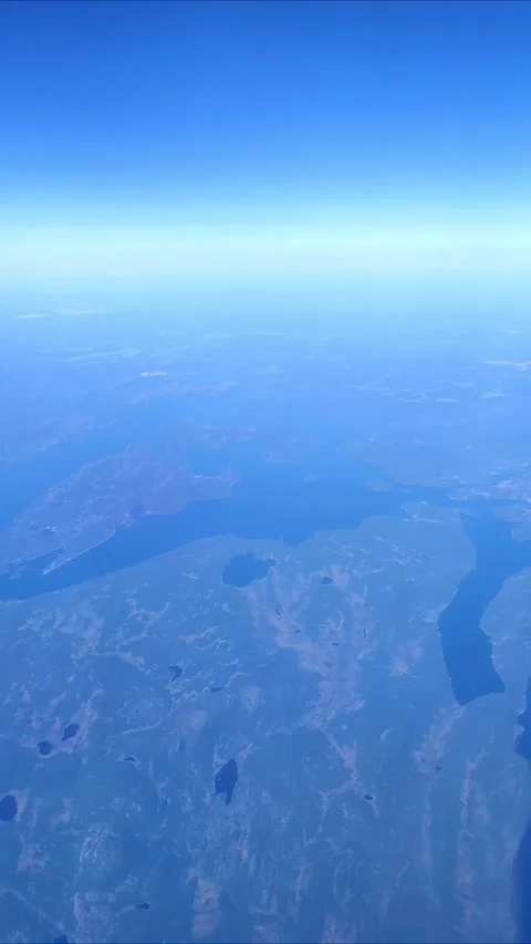Aerial view from plane Window. Beautiful blue lakes on the Kola Peninsula. Stock Footage 290236580