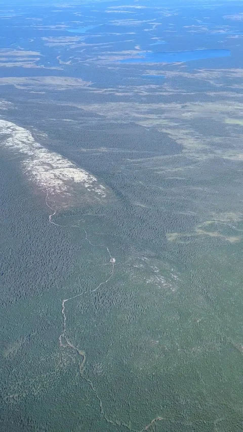Aerial view from plane Window. Beautiful landscape on the Kola Peninsula. Hills. Video stock 295678688