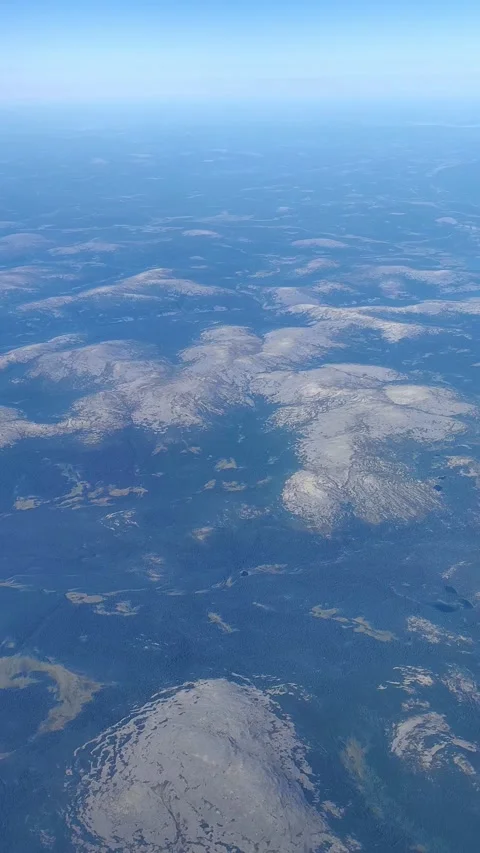 Aerial view from plane Window. Beautiful landscape on the Kola Peninsula. Hills. Stock Footage 295875614