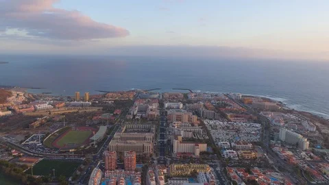 Aerial view of Playa de las Americas on sunset in Tenerife, Canary Islands Video stock 97699338