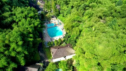 Aerial view of The Plot of land with house and swimming Pool Aerial Shot Stock Footage 233139450