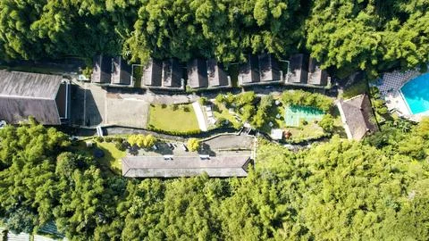 Aerial view of The Plot of land with house and swimming Pool Aerial Shot Fotos de archivo