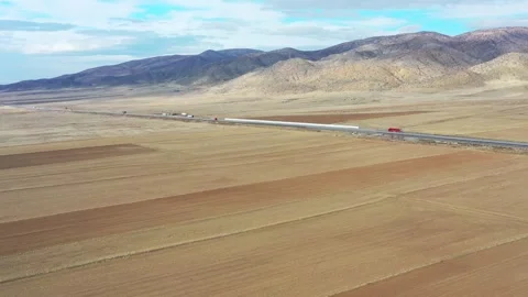 Aerial view of plowed fields and highway, Turkiye. Stock Footage 321002114
