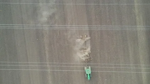 Aerial view of a  plowing tractor Stock Footage 198060634