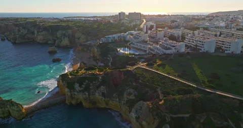 Aerial view of the point dramatic cliffs and lighthouse of Ponta da Piedade at Stock-Footage 315308263