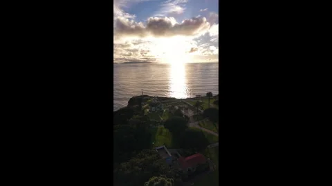 Aerial View of Point Fermin Lighthouse Facing Sunset Stock Footage 328127422