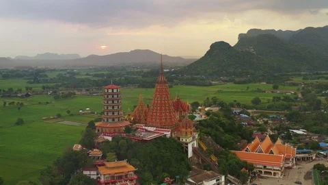Aerial view point of interested of Architecture golden big buddha during sunset Stock Footage 119898439