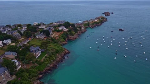 Aerial View of Pointe du Decolle Peninsula and Moored Boats in Saint-Lunaire Stock Footage 346331189