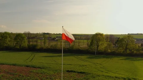Aerial View of a Polish flag near Wold War 2 Bunker in the spring sunset Stock Footage