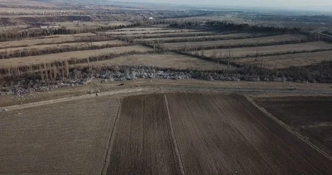 Aerial view of polluted place full of plastic bags and landscape Vídeos de archivo 125538323