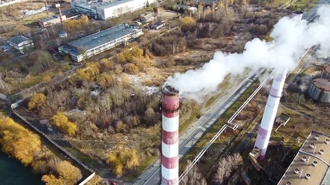 Aerial view of pollution of the environment: a pipe with smoke. Stock Footage 122423649