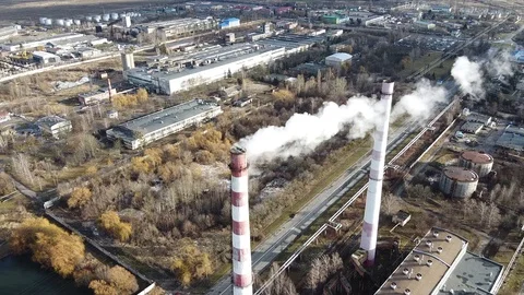 Aerial view of pollution of the environment: a pipe with smoke. Stock-Footage 122424119