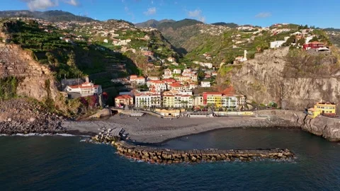 Aerial view of Ponta do Sol, Madeira island. Cozy resort village with colorful Vidéo 169147341