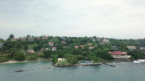 Aerial view of pool and mini-golf by the ocean in Nasugbu, Philippines Stock Footage 117779937