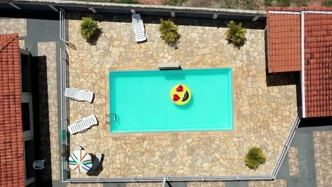 Aerial View Of Pool Float In The Swimming Pool Stock Footage 140387991