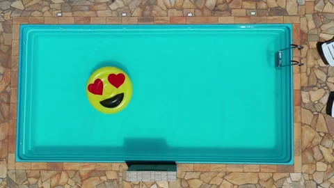 Aerial View Of Pool Float In The Swimming Pool Stock Footage 140388048