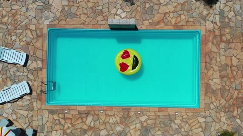 Aerial View Of Pool Float In The Swimming Pool Stock Footage 140388252