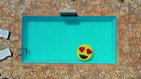 Aerial View Of Pool Float In The Swimming Pool Stock Footage 140388283