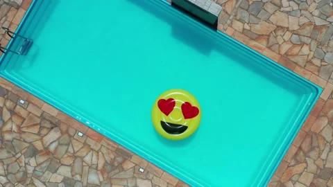 Aerial View Of Pool Float In The Swimming Pool Stock Footage 140388989