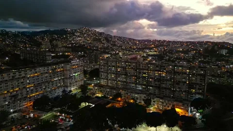 Aerial view of poor residential district in Caracas, Venezuela at night. Famous Stock Footage 221835162