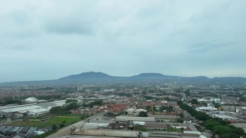 Aerial view poor urban planning in Bandung, settlement industries and warehouse Stock Footage 295050436