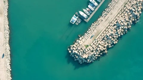 Aerial view of the port with return of fishing parcels Stock Footage