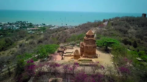 Aerial view of poshanu cham tower overlooking the sea Stock Footage 329485069