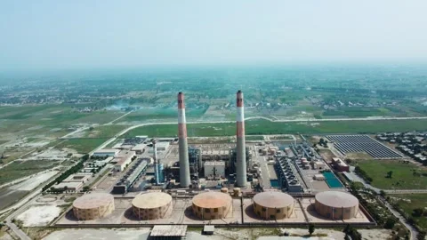 Aerial View of Power Generation Facility in Rural Arid Landscape Stock Footage 344407008