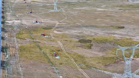 Aerial View of Power Line Construction and Drilling Operations Tibet China Stock Footage 346576952