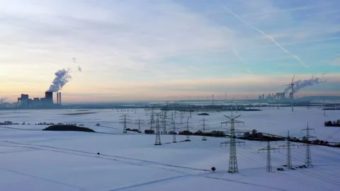 Aerial View of Power Lines in a Wintry Landscape Vídeo Stock 263178946