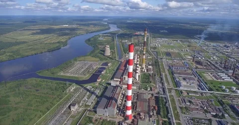 Aerial view of power plant facility on river Video stock 80632658
