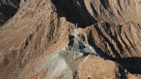 AERIAL, View of Power Pole at the mountain in UAE Video stock 101042469
