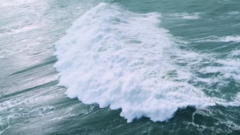 Aerial View of a Powerful Ocean Wave Crashing Stock Footage 296696596