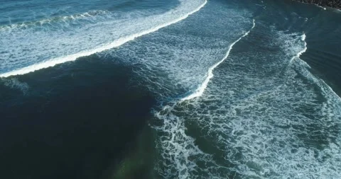 Aerial view of powerful ocean waves breaking The Concept of natural energy Stock Footage 335762857