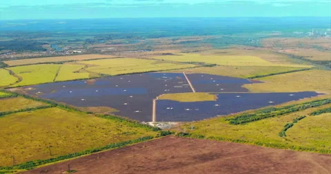 Aerial view of a powerful solar-powered plant that generates electricity using Stock Footage 139423089