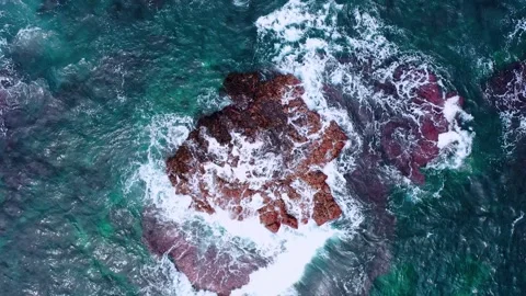 Aerial view of powerful waves crashing coastline of Jeju Island, South Korea Stock Footage 296563490