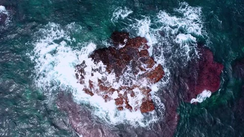 Aerial view of powerful waves crashing coastline of Jeju Island, South Korea Stock Footage 296563836