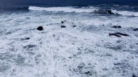 Aerial View of Powerful Waves Crashing on Rocks The Concept of Nature Force Stock Footage 327445199