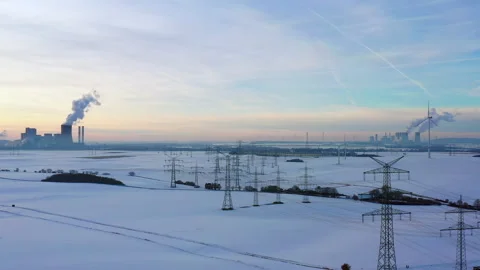 Aerial View of PowerLines in a Wintry Landscape Stock Footage 263180918