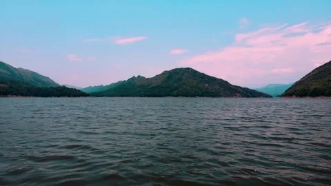 Aerial view of the prado dam side where you can see a lot of water as the sea Stock Footage 218048314