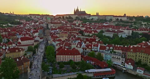 Aerial view of Prague Charles bridge and old town at sunset, over river. Czech Video stock 323959637
